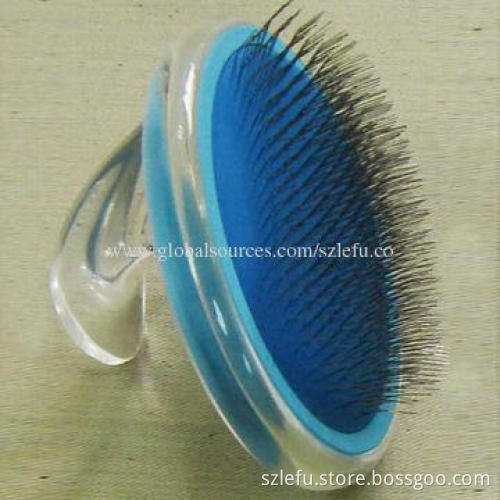 Oval-shaped slicker brush, also with massage and pin bristle